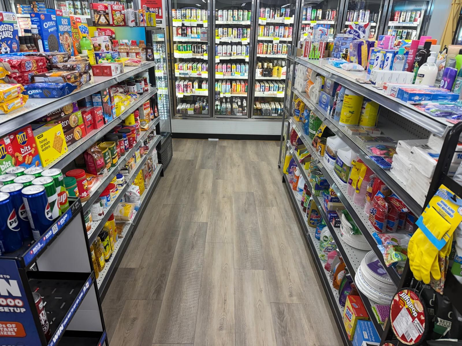 Grocery and pantry shelves — cereal, canned goods and household staples