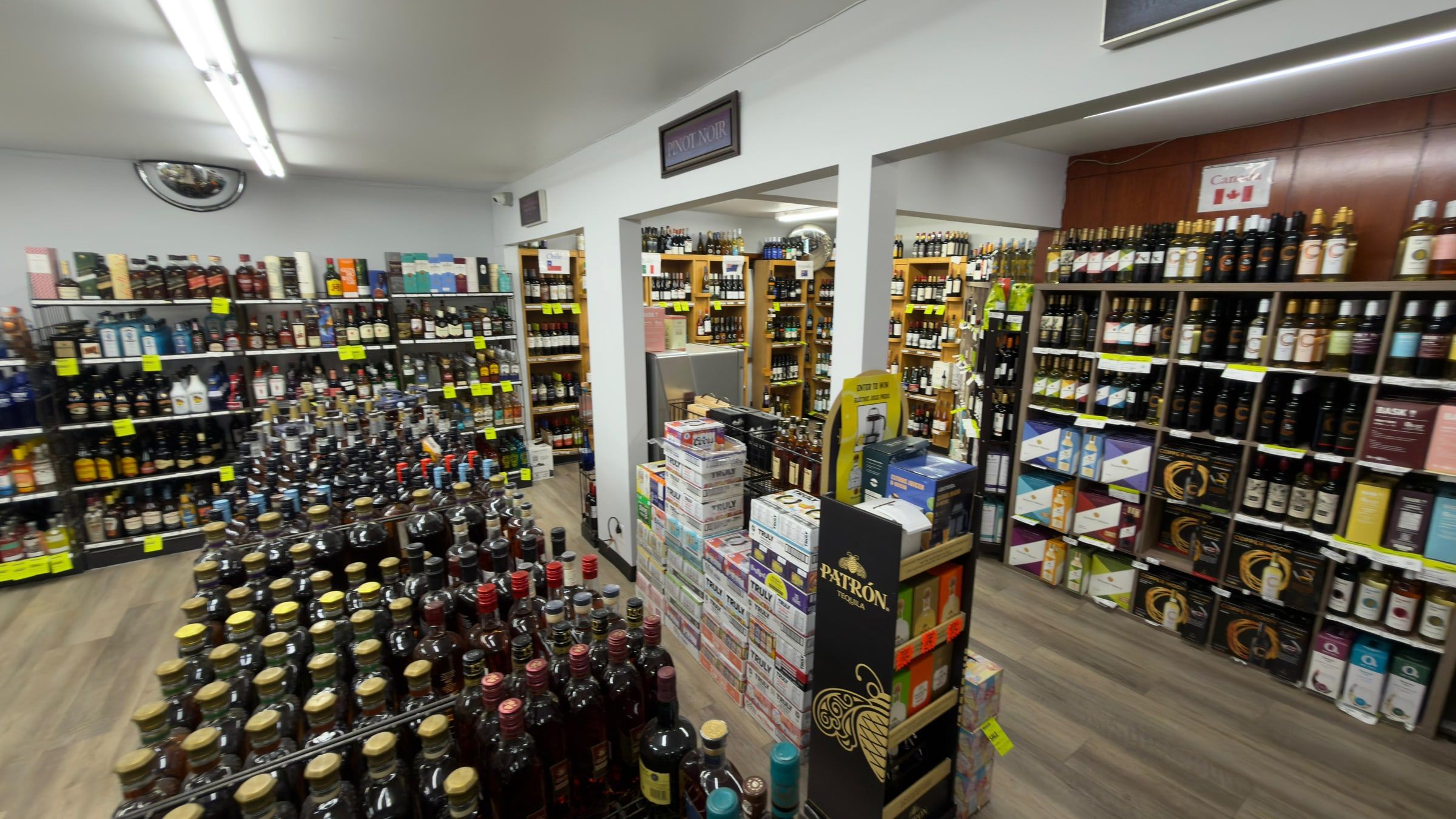 The spirits aisles and sparkling wine shelves inside the liquor vendor