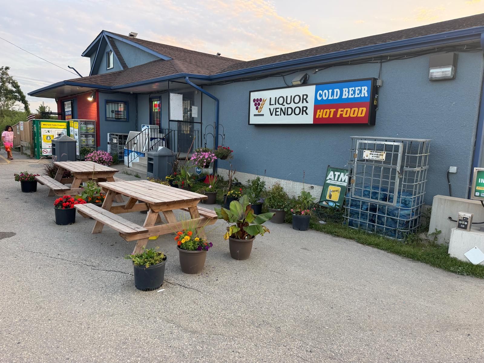 The front of Garven Convenience, signed for liquor, cold beer and hot food